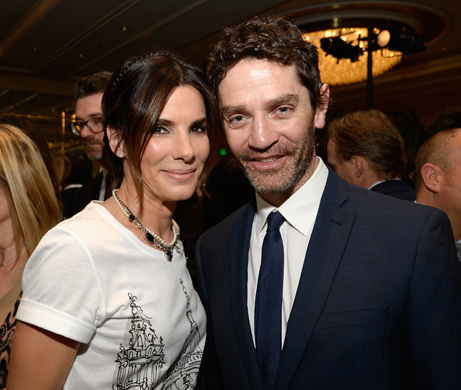 BEVERLY HILLS, CA - JANUARY 11:  Actress Sandra Bullock (L) and actor James Frain attend the BAFTA LA 2014 Awards Season Tea Party at the Four Seasons Hotel Los Angeles at Beverly Hills on January 11, 2014 in Beverly Hills, California.  (Photo by Kevork Djansezian/BAFTA LA/Getty Images for BAFTA LA)